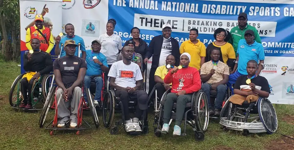 Ugandan para-athletes and officials at a disability sports event