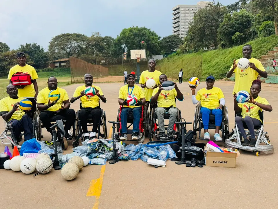 Wheelchair rugby athletes with donated sports equipment
