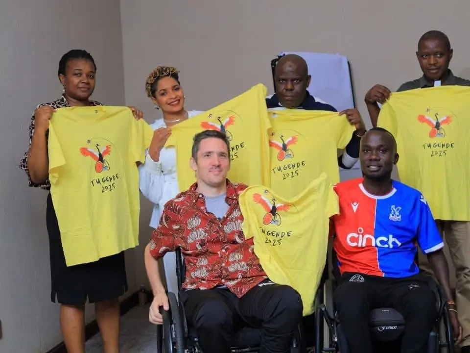 TUGENDE organisers displaying event shirts