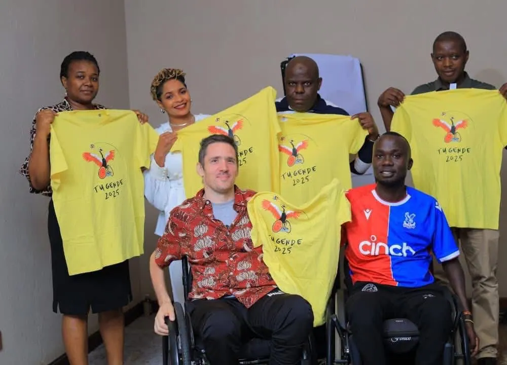 Ugandan and international friends displaying TUGENDE 2025 shirts